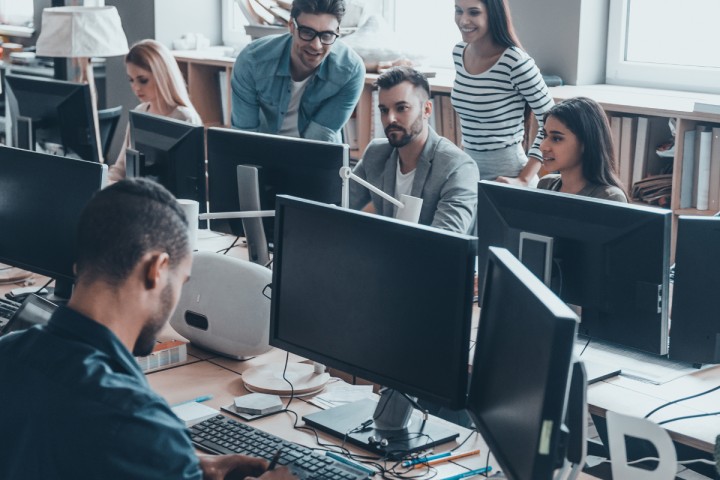 Group of people working in an office.